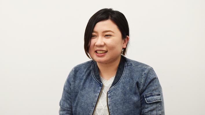 笑顔で今後の目標を話すC.Kさんの画像